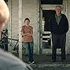 Michael Caine, John Lithgow, and Mackenzie Foy in Interstellar (2014)