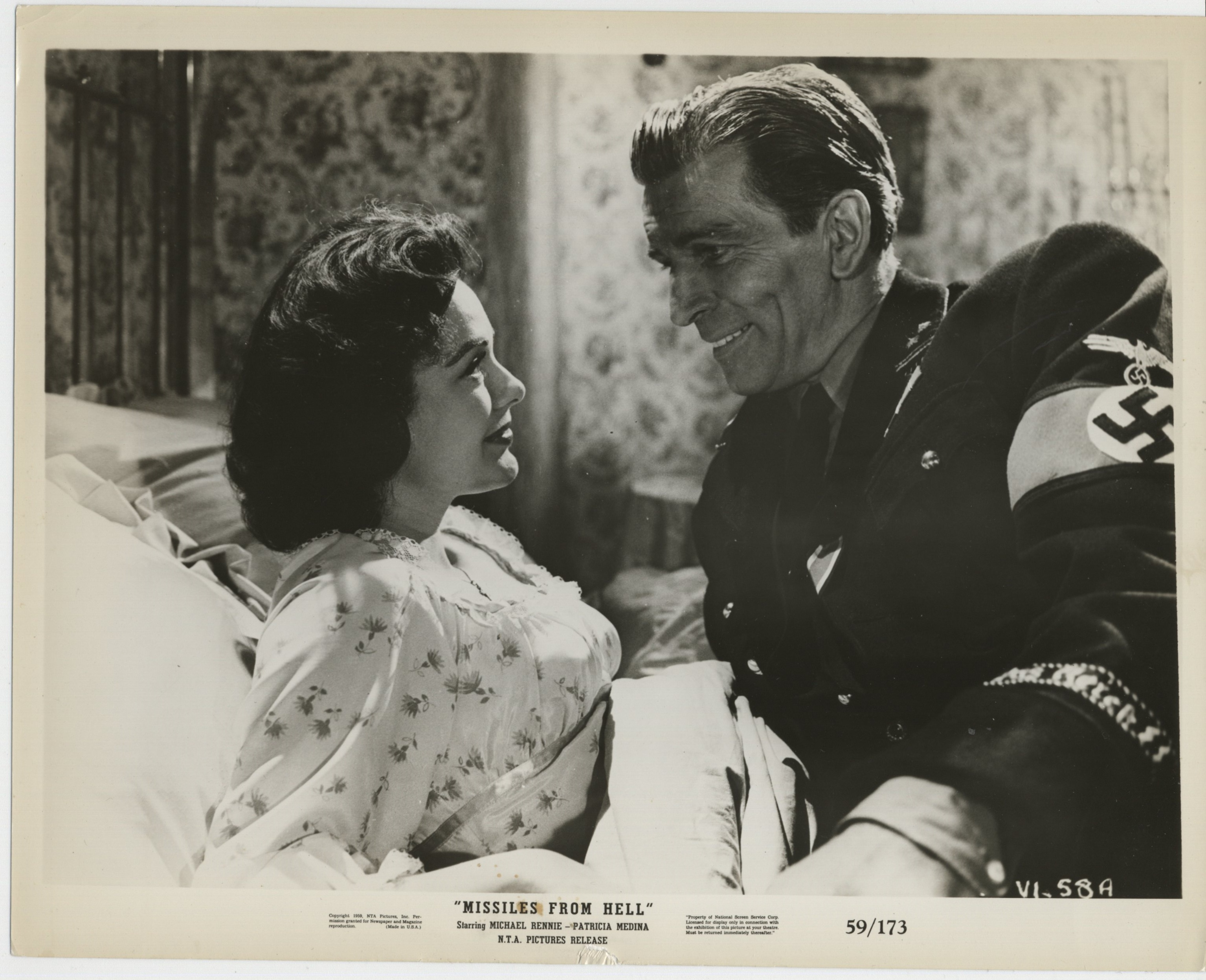 Patricia Medina and Michael Rennie in Missiles from Hell (1958)