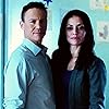 Brian Krause and Emmanuelle Vaugier in His Double Life (2016)