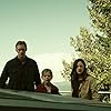 Alexander Skarsgård, Andrea Riseborough, and Emily Alyn Lind in Hidden (2015)