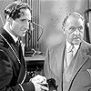 Basil Rathbone and Holmes Herbert in Sherlock Holmes in Washington (1943)