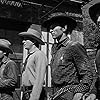 Lee Van Cleef, Ian MacDonald, Robert J. Wilke, and Sheb Wooley in High Noon (1952)