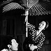 Kyôko Kishida and Eiji Okada in Suna no onna (1964)