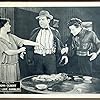 John Gilbert, W.E. Lawrence, and Carmel Myers in The Love Gambler (1922)