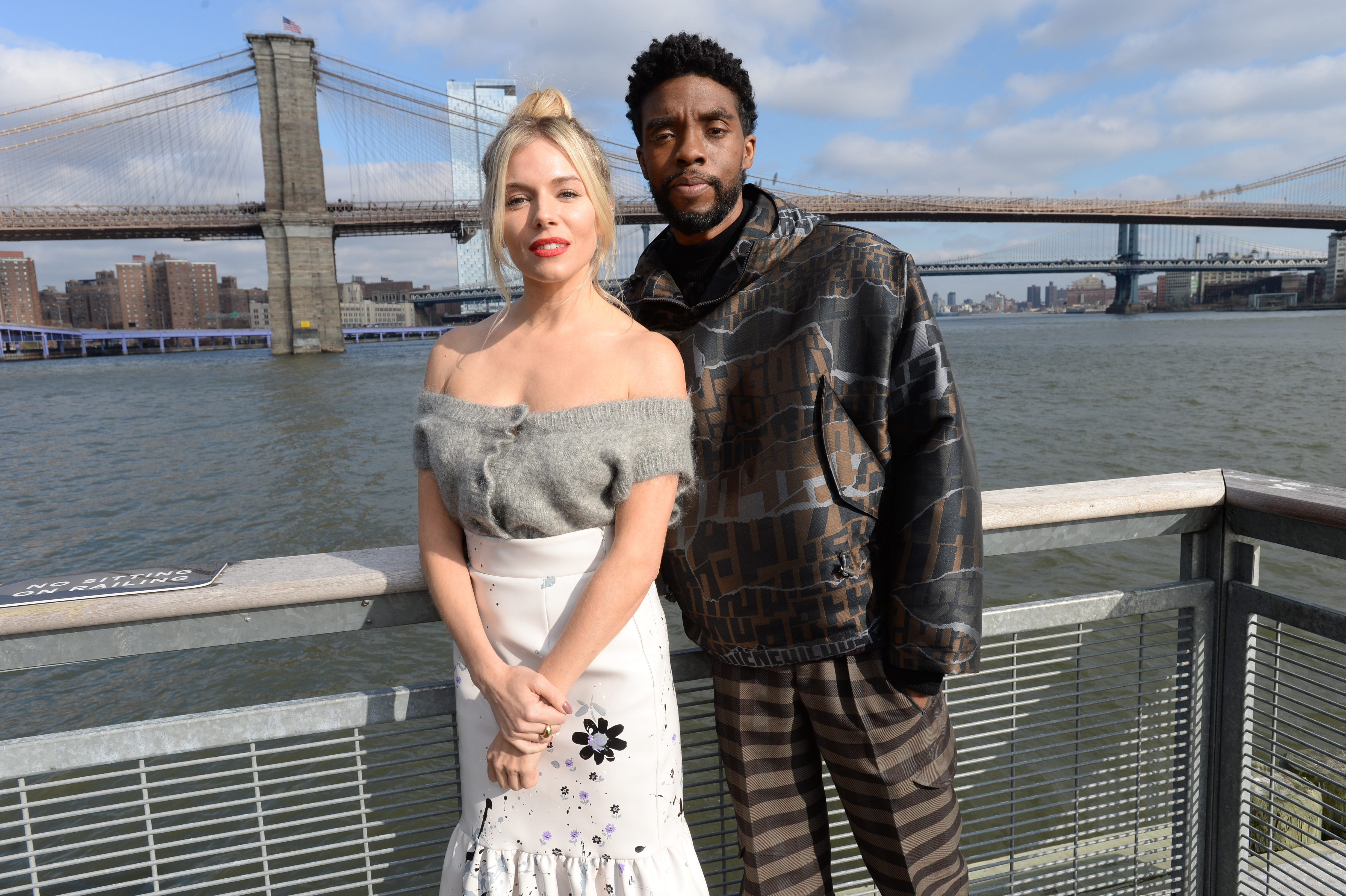 Sienna Miller and Chadwick Boseman at an event for 21 Bridges (2019)