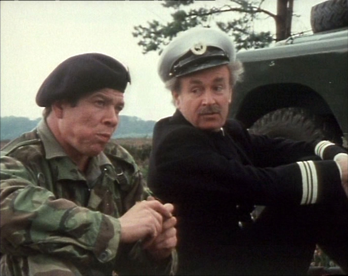 William Russell and Roy Holder in Spearhead (1978)