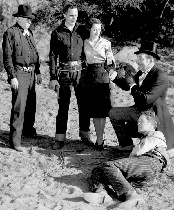 Theodore Lorch, Jeanne Martel, Forrest Taylor, Tom Tyler, and Slim Whitaker in Orphan of the Pecos (1937)