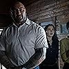 Nikki Amuka-Bird, Dave Bautista, and Abby Quinn in Knock at the Cabin (2023)