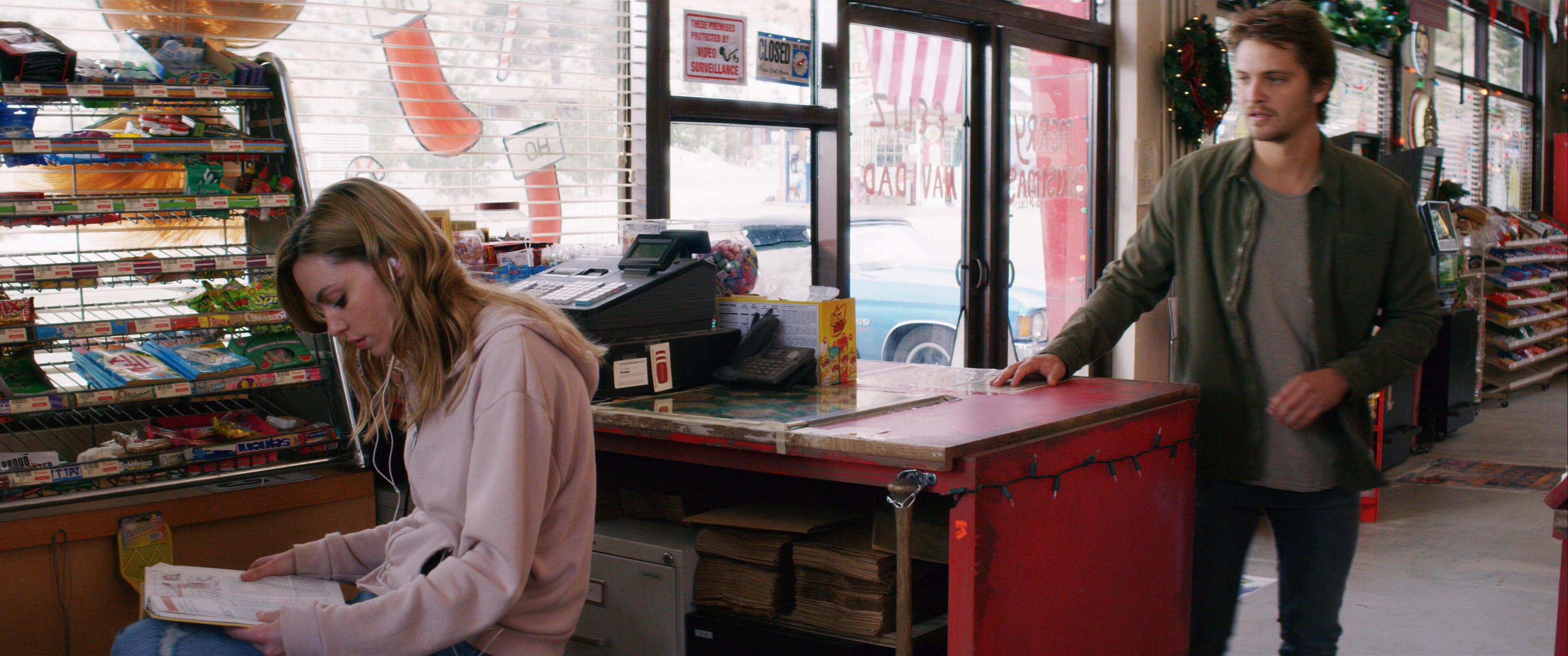 Luke Grimes and Michelle Mylett in El Camino Christmas (2017)