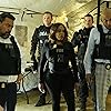 James Lesure, Niecy Nash, and Felix Solis in The Rookie: Feds (2022)