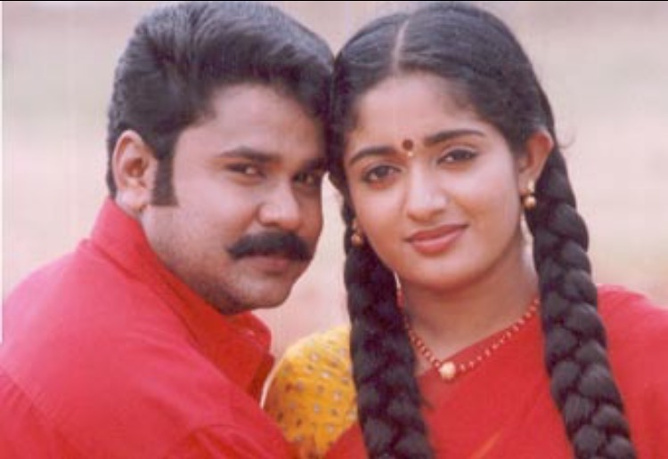 Dileep and Kavya Madhavan in Meesha Madhavan (2002)