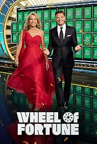 Vanna White and Ryan Seacrest in Wheel of Fortune (1983)