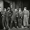 Oliver Hardy, Bob Kortman, Stan Laurel, Walter Long, and Leo Willis in Pardon Us (1931)