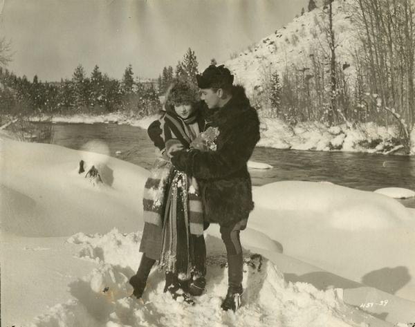 Betty Compson and Tom Moore in Over the Border (1922)