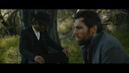 Civil War Vet, Finnegan (Thom Chacon) talks with Wild Bill (Arthur Sylense).