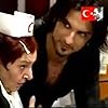 Suna Pekuysal and Tarkan in Yeter Anne (2002)