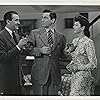 Lee Bowman, Walter Pidgeon, and Rosalind Russell in Design for Scandal (1941)