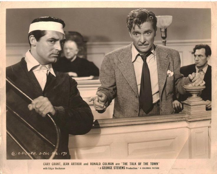 Cary Grant, Ronald Colman, Tom Tyler, and George Watts in The Talk of the Town (1942)