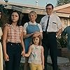 Paul Dano, Michelle Williams, Keeley Karsten, Sophia Kopera, Gabriel LaBelle, and Julia Butters in The Fabelmans (2022)