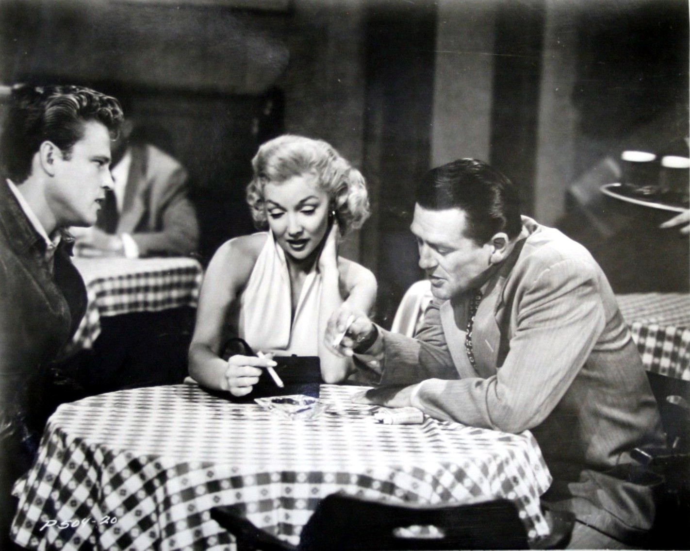 Mari Blanchard, John Ericson, and Charles McGraw in The Cruel Tower (1956)