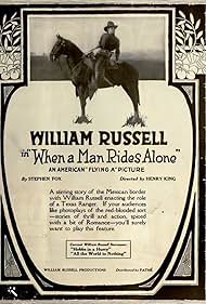 William Russell in When a Man Rides Alone (1919)