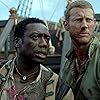 Hakeem Kae-Kazim and Tom Hopper in Black Sails (2014)