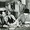 Joseph Cotten, Dolores Del Río, Jack Durant, and Jack Moss in Journey Into Fear (1943)