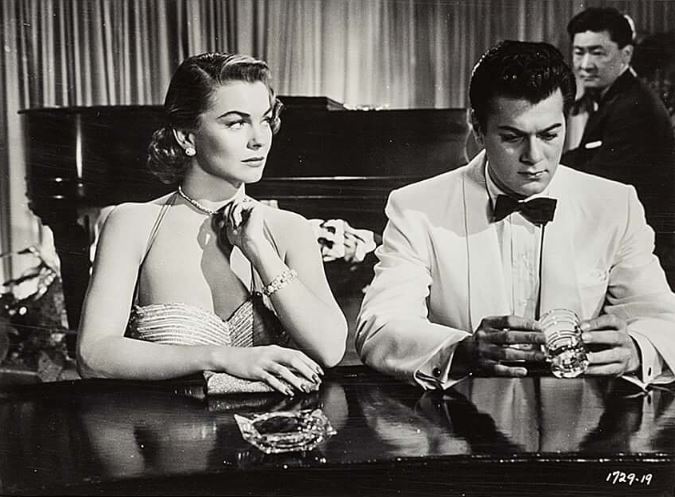 Tony Curtis, Joanne Dru, and Victor Sen Yung in Forbidden (1953)