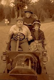 Roscoe 'Fatty' Arbuckle, Ted Edwards, and Mabel Normand in Fatty and Mabel's Simple Life (1915)