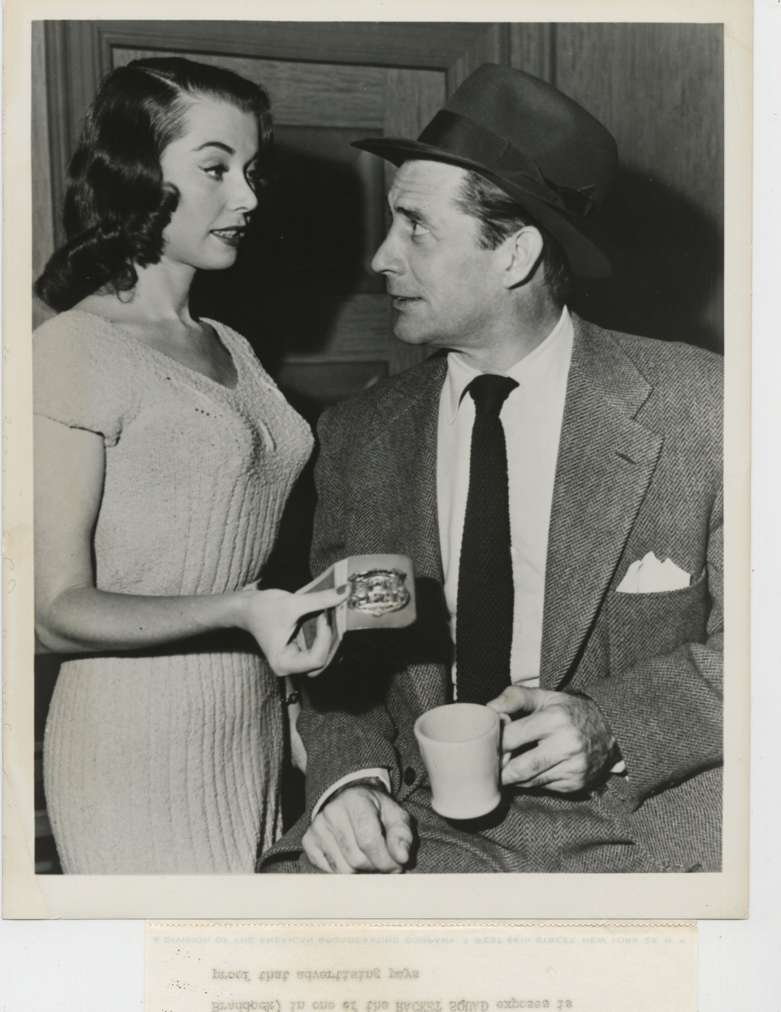 Reed Hadley and June Wurster in Racket Squad (1950)