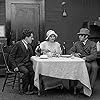 Charles Chaplin, Edna Purviance, and Wesley Ruggles in Police (1916)