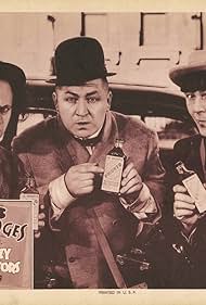 Moe Howard, Larry Fine, and Curly Howard in Dizzy Doctors (1937)