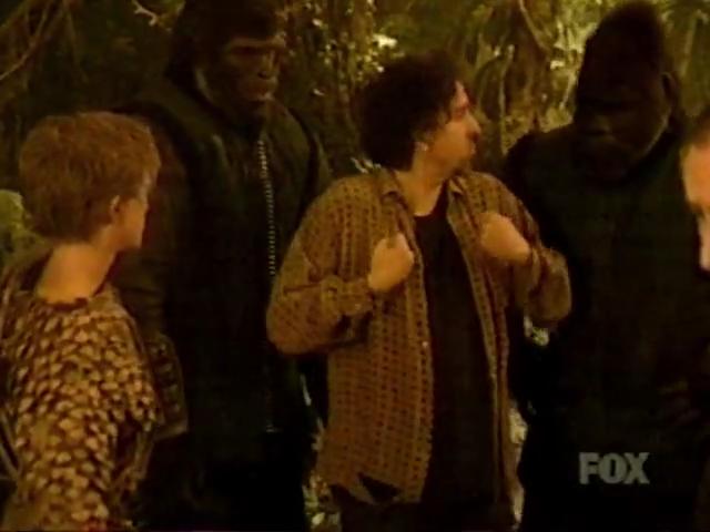 Tim Burton, Lucas Elliot Eberl, Kevin Grevioux, and Isaac C. Singleton Jr. in Planet of the Apes: Rule the Planet (2001)