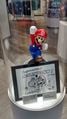 Mario's maquette found in the store and Shigeru Miyamoto's sketch congratulating the store on its opening.