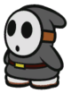 A black Shy Guy in Paper Mario: Color Splash.