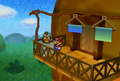 Goompa talking to Mario while fixing the veranda of the house