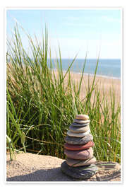 Taulu A tower of stones on a dune at the sea - Buellom