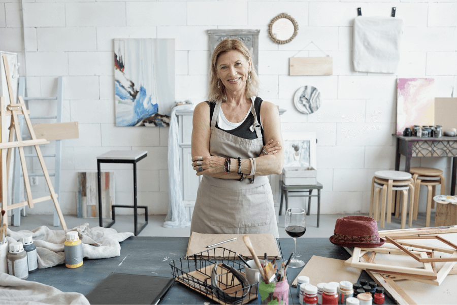 photo of woman standing in craft room