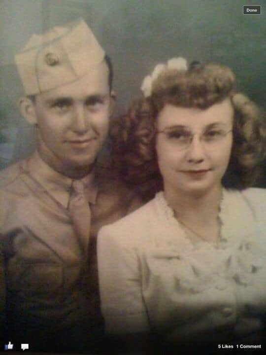 old photograph of woman and man in uniform