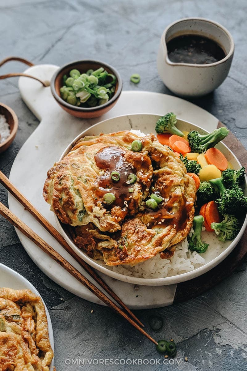 Egg foo young with gravy on rice