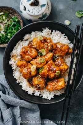 Crispy sesame chicken over steamed rice