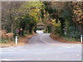 TM2241 : The Street and the railway bridge on the road to Nacton by Geographer