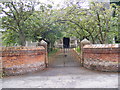 TM3569 : The Entrance of St.Michael's Church,Peasenhall by Geographer