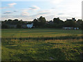 NY7708 : Evening shadows over the cricket field by Stephen Craven