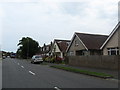 SZ9099 : Houses at Rose Green in West Sussex by James Denham