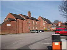 SP2872 : The rear of the United Reformed Church and Conservative Club by John Brightley