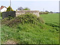 TM2262 : Pillbox on the A1120 Mill Hill, Earl Soham by Geographer