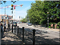 TQ3579 : Zebra crossing on Surrey Docks Road by Stephen Craven