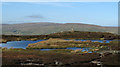 NY8428 : Pool and trig point at  Thistle Green by Trevor Littlewood