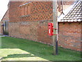 TM2548 : Seckford Hall Postbox by Geographer